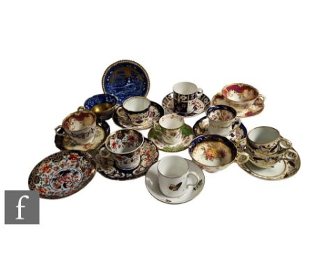 A collection of 19th Century and later china tea and coffee cups and saucers, mostly English, to include a Minton example wit