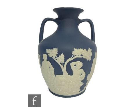 A later 20th Century Wedgwood copy of the Portland Vase,&nbsp;blue jasper dip with relief figures unclothed with flowing drap