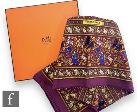 A&nbsp;Hermes Chasse En Inde silk scarf, designed in 1986 by Michel Duchene, decorated with a repeat pattern of stylised hors