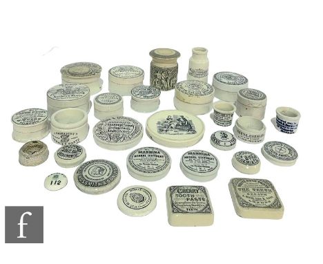A collection of black and white potlids, some with bases, to include two Army &amp; Navy Co-operative society lids, anchovy p