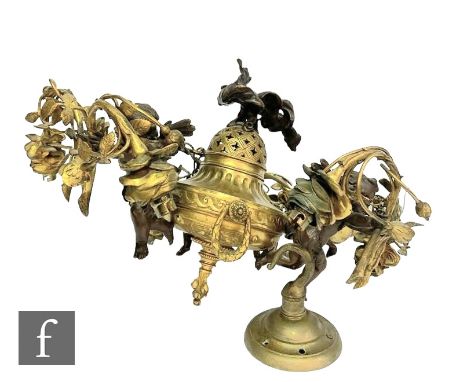 An early 20th Century French ceiling light fitting of conical fluted gilt form, mounted with three winged bronze amorini each