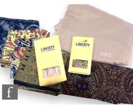 A collection of five Liberty silk scarves, to include the Golden Jubilee of HM Queen Elizabeth II in blue, 87cm x 87cm, an Ar