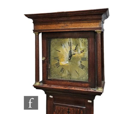 A late 18th Century oak and mahogany crossbanded longcase clock with eight-day movement striking on a bell, the 12 inch squar