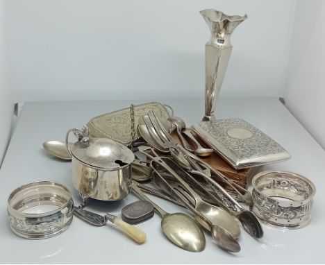 A quantity of silver items, to include a candlestick, cigarette case mustard pot with glass insert, etc, total weight 8.12oz,