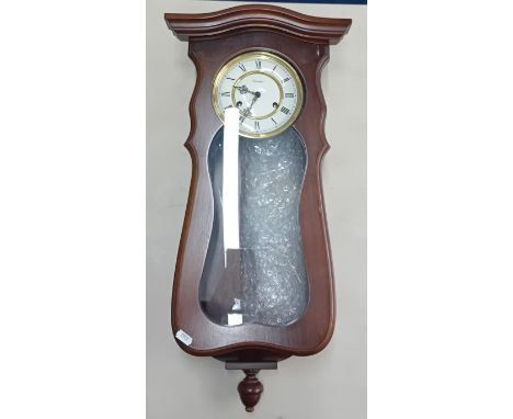 A 20th century Kieninger wall clock, dark wood, roman enamel dial, height 61cm.Sold on behalf of the Samaritans of Plymouth.