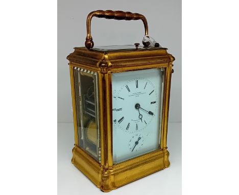 A french gilt repeat carriage clock, marked Le Roy &amp; Fils, Paris, with two keys.