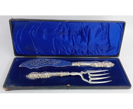 A Victorian silver fish slice and fork, cased, of foliate embossed, engraved and pierced decoration, hallmarked Birmingham 18