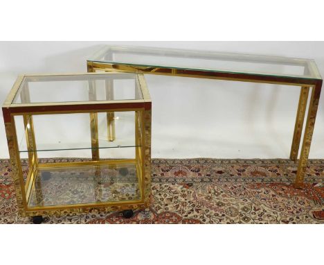 A 1980s Italian contemporary gilt brass glass inset three-tier occasional table, raised on roller castors, width 70cm, togeth