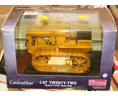 A Norscot 1/16 scale boxed Caterpillar 22 track type tractor housed in the original plastic window box 