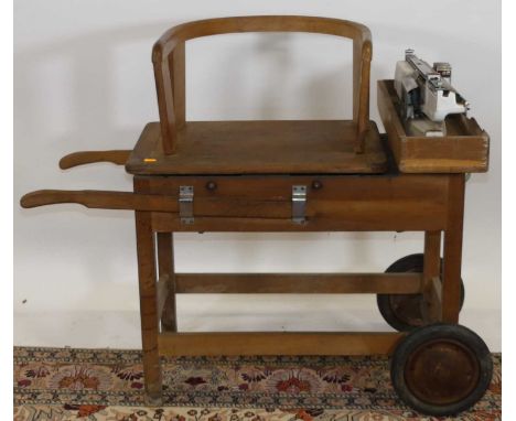 A mid-20th century oak set of jockey scales