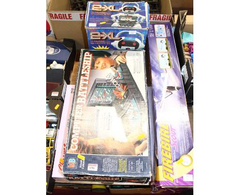 A quantity of mixed electronic games and puzzles to include Battleships, a Tomy 2-XL Talking Robot, a Firebird Scout radio-co