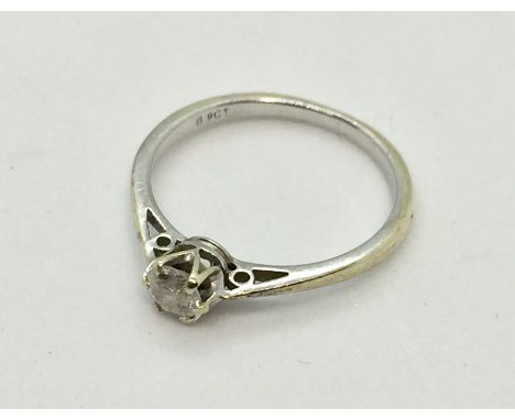 A diamond solitaire ring set in 9 ct gold
