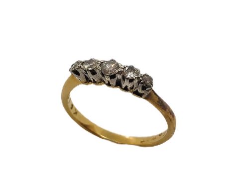 An 18ct gold ring with five diamonds