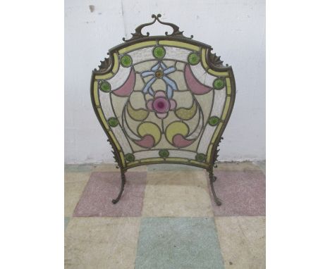 A stained glass fire screen