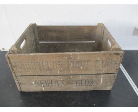 A vintage wooden apple crate - marked Fairfields Fruit Farm, Newent, Glos.