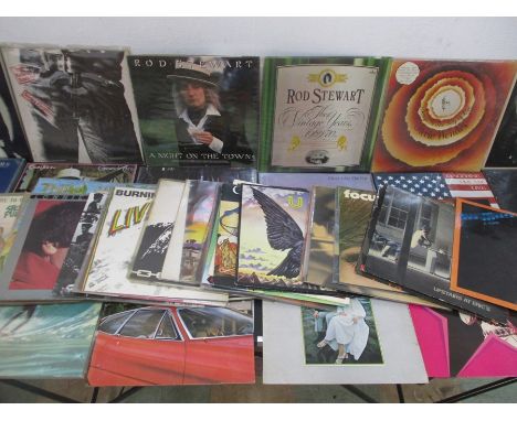 A collection of vinyl records including The Rolling Stones (including box set) ELO, Elton John, Elvis Presley, Stevie Wonder,