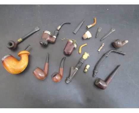 A collection of vintage smoking pipes