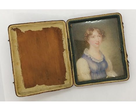 A cased miniature portrait on ivory of a lady.