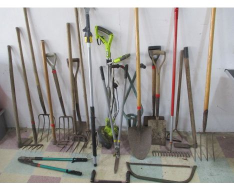 A collection of garden tools, Ryobi electric strimmer etc.