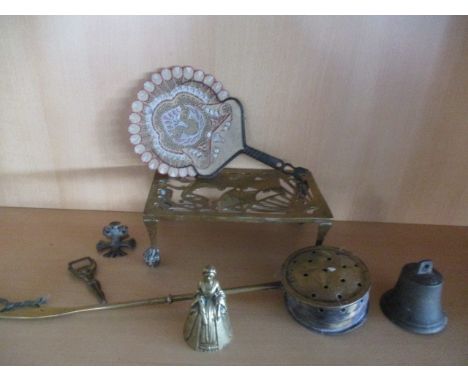A Javanese fan, bronze bell, bottle opener in the form of a nude lady, etc.