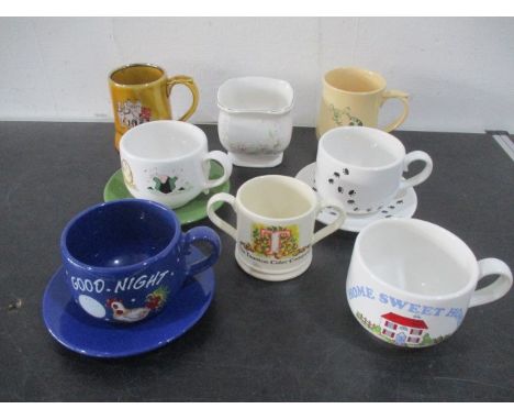 A collection of Wade china including a Taunton Cider two handled mug