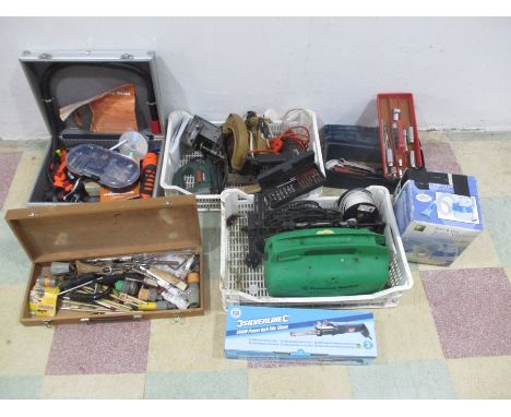 A collection of various tools and accessories including a Renovator Twist-A-Saw, Auto Vacuum, Silver Line power belt file, so