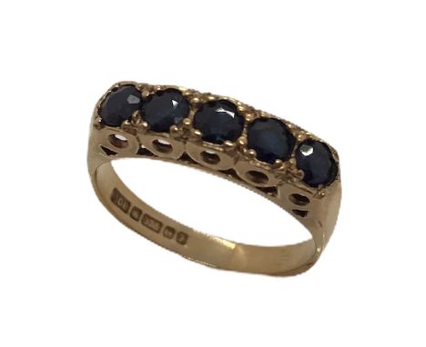 A 9ct gold ring with five sapphires  