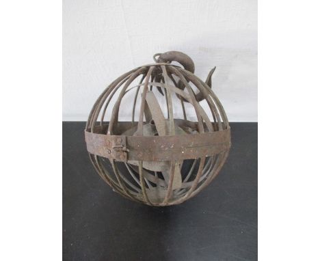 An antique maritime ships gimbal twin lamp in ball cage, along with two vintage rope pulleys
