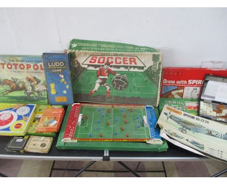 A collection of various vintage board games including Chad Valley Soccer, Totopoly, Cluedo, Draughts etc