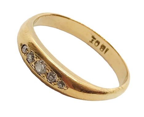 An 18ct gold diamond five stone ring