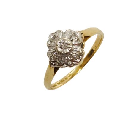 An 18ct gold ring with square shaped diamond cluster