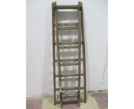 A vintage wooden stepladder