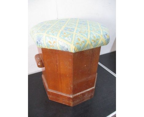 A Victorian octagonal commode with upholstered seat