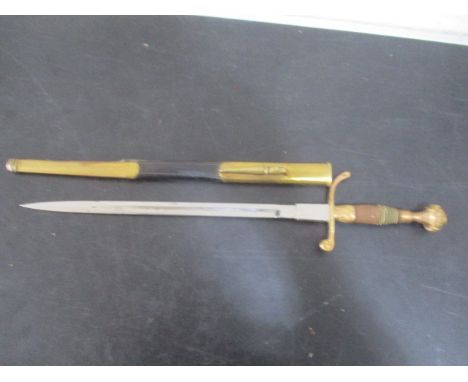 An officers dirk in leather and brass scabbard A/F