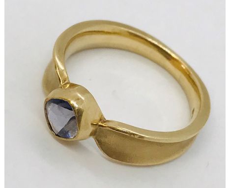 A 9ct rose gold ring set with an amethyst. Total weight 3.9g