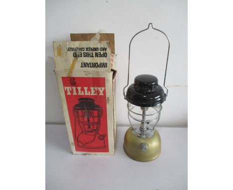 A boxed Tilley Lamp