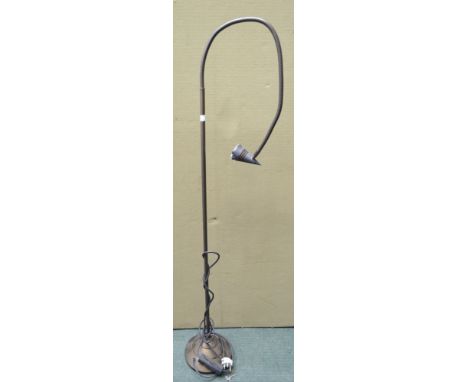An adjustable standard reading lamp