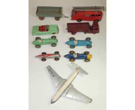 DINKY - four racing cars; 421 Hindle Smart Helecs BR; 132 Packard, light green with driver; 555 Fire Engine; 702 comet BOAC a