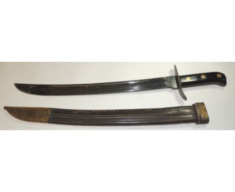 A cutlass type sword with plain, black grip, broad slightly curved blade with deep fuller and in brass mounted brown leather 