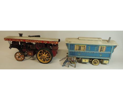 A scratch built model of a showmans engine and caravan, constructed from metal and wood with hand painted finish, 19cms high 