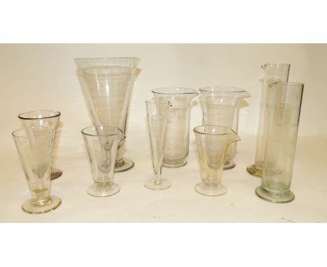 Ten assorted clear glass measures all with etched scales (10)