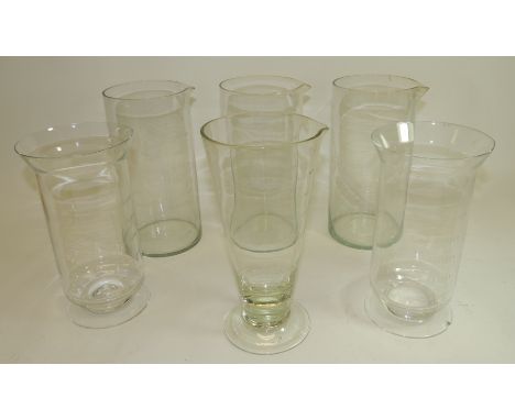 Six large clear glass measuring jugs with etched scales (6)