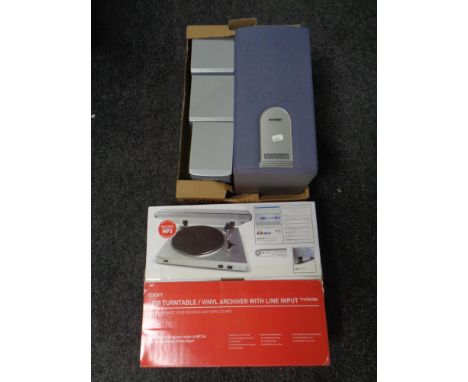 An Medion five speaker surround sound system together with a boxed Ion USB turntable, boxed.