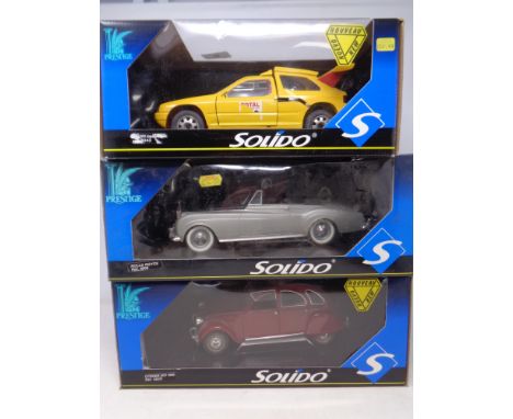 Three Solido Prestige 1:18 die cast cars - Rolls Royce, Citroen 2 CV and a Opal car 