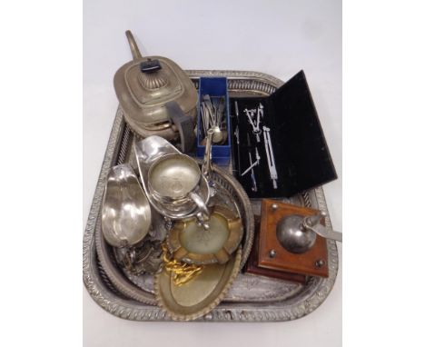 A tray of silver plated serving tray, plated wares including teapot, gravy boats, spoons, coffee grinder and cased drawing se