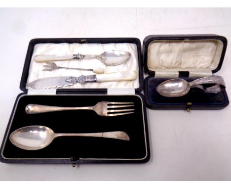 A Birmingham silver fork and spoon 1926, cased, together with a Birmingham silver baby spoon, cased, and further spoon knife 