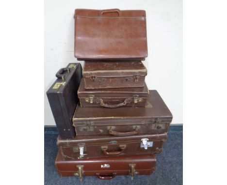 Seven vintage luggage and briefcases 