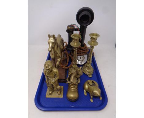 An early twentieth century candlestick telephone together with assorted brass ware, horse and miner figure, candlesticks etc 