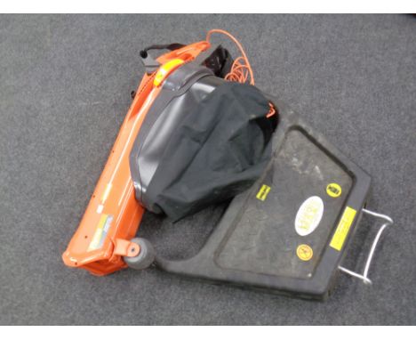 A Flymo 2700W turbo garden vacuum together with a ladder stand 