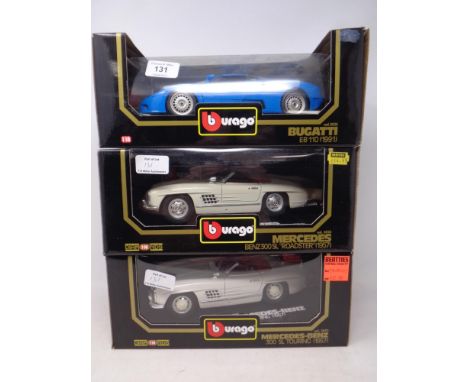 Two Burago Diamonds 1:18 die cast cars - Mercedes Benz SL 300 Roadster 1957, Mercedes Benz SL Touring and a Burago 1:18 model